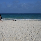 White sand, blue water, beautiful girls passing by â€¦