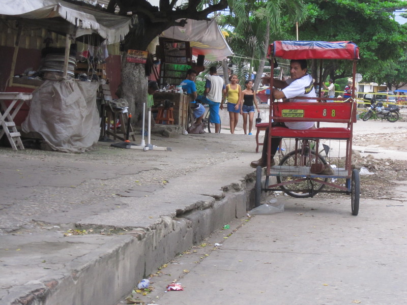 Memories of India: a rickshaw and a half-metre high pavement . . .